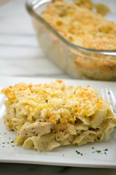 Chicken Noodle Casserole - cooked chicken and noodles mixed with a savory flavored sauce. A weeknight meal made even easier with a rotisserie chicken!