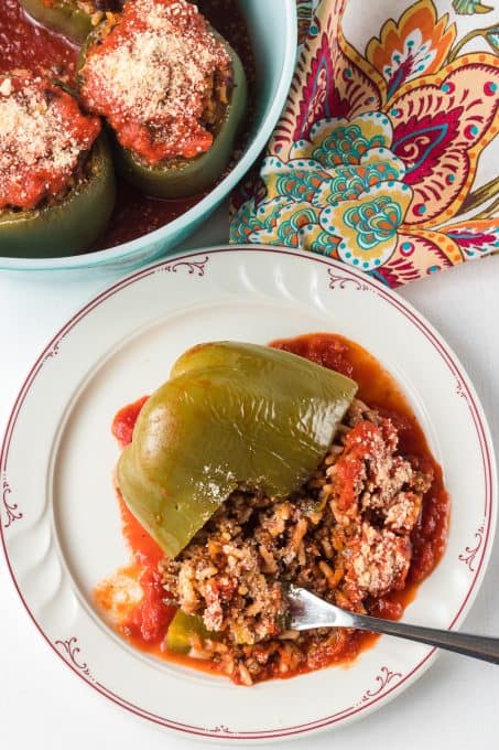 A stuffed pepper in tomato sauce.