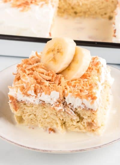 Toasted coconut on a tres leches cake made with bananas.