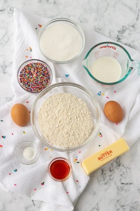 Ingredients to make sprinkle cupcaked.