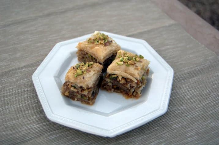 Baklava - layers of buttered phyllo dough, with chopped pistachios, almonds and walnuts all covered with a honey syrup. Delicious!