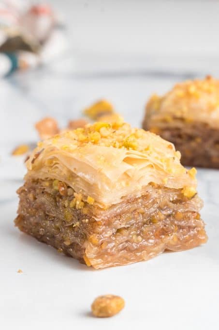 Layers of phyllo dough, walnuts and pistachios soaked in a honey syrup.