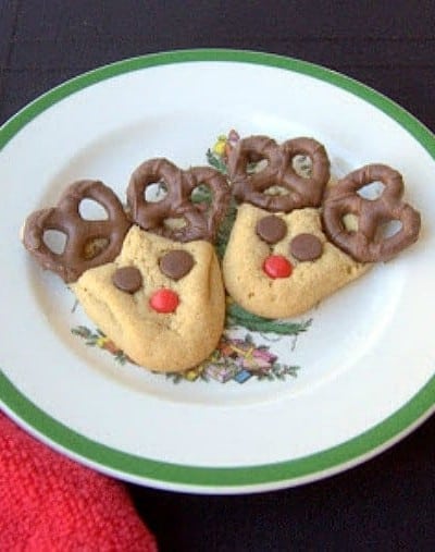 Peanut Butter cookies with chocolate covered pretzels, cinnamon red hots and chocolate chips make these fun holiday cookies!