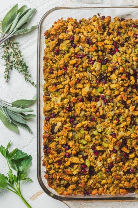 Pomegranate arils, celery, onion, fresh herbs, and chicken broth mixed with boxed stuffing mix.