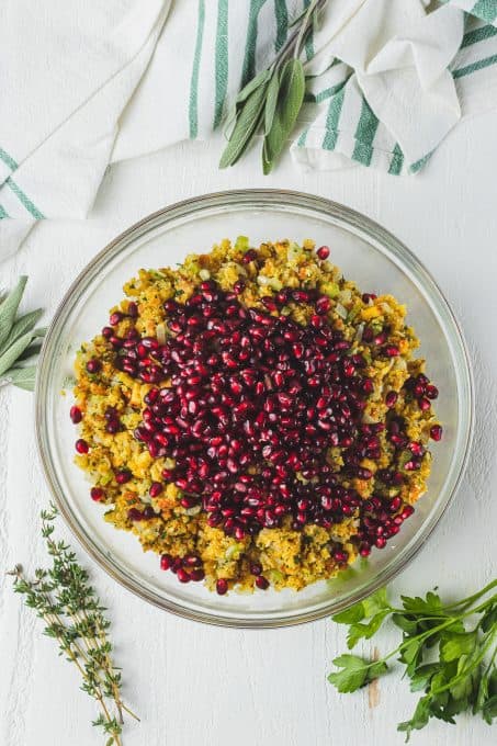 Pomegranate arils on top of Tthanksgiving stuffing.