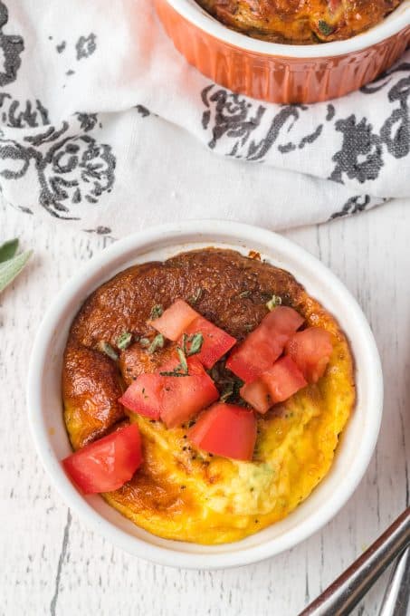 Tomatoes top Baked Eggs.