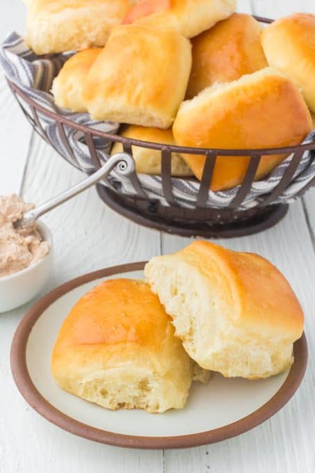 Copycat restaurant soft and fluffy dinner rolls with cinnamon honey butter.