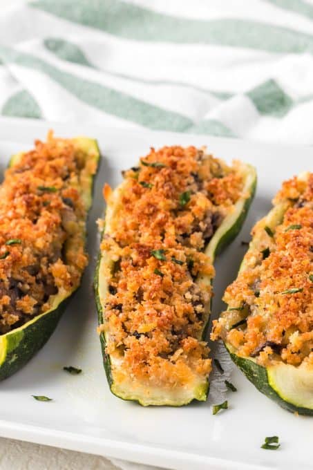 Zucchini stuffed with mushrooms and onions and topped with a panko bread crumbs.