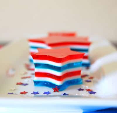 4th of July Jello Stars - layers of red, white and blue gelatin make up this colorful, and fun dessert to serve at all the Patriotic holidays!