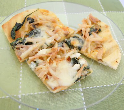 This Grilled Spinach, Feta and Chicken Pizza is definitely one dinner recipe you'll want to put on your pizza night menu!