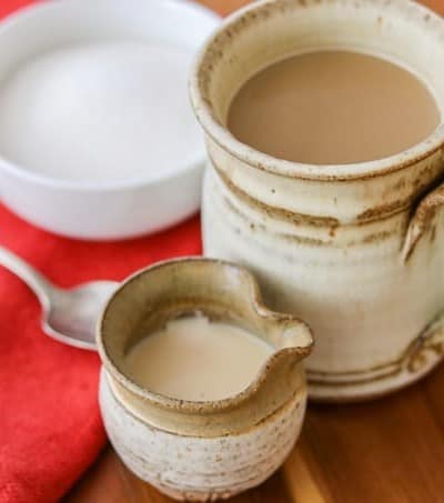 Homemade French Vanilla Coffee Creamer with a cup of coffee.