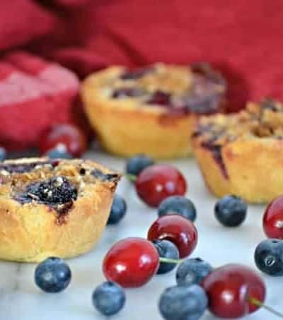 These Blueberry Cherry Mini Crumb Pies contain the fresh tastes of summer in a bite-sized treat!