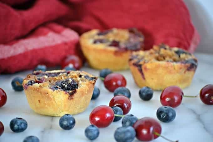 These Blueberry Cherry Mini Crumb Pies contain the fresh tastes of summer in a bite-sized treat!