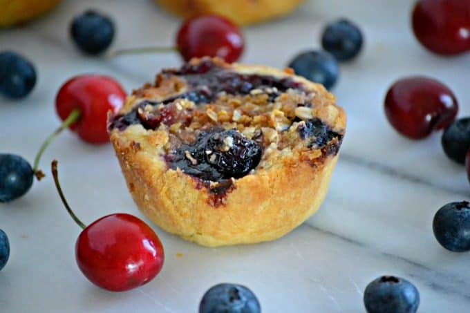 These Blueberry Cherry Mini Crumb Pies contain the fresh tastes of summer in a bite-sized treat!