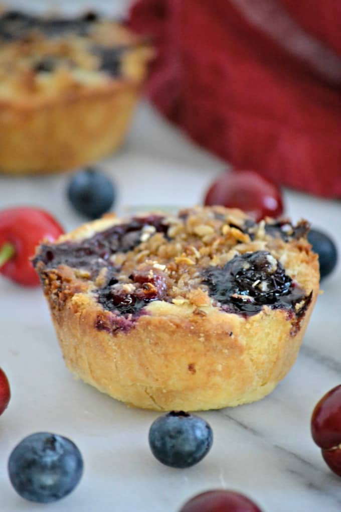 These Blueberry Cherry Mini Crumb Pies contain the fresh tastes of summer in a bite-sized treat!