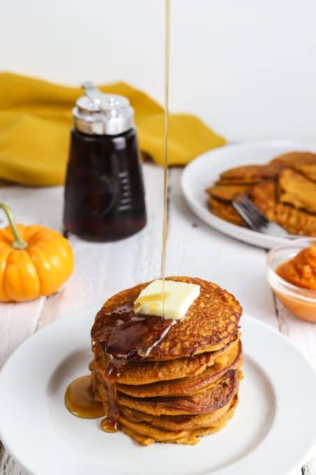 A stack of pancakes made with pumpkin.