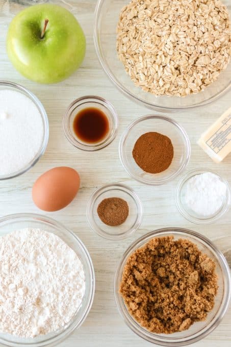 Ingredients for oatmeal cookies with apple.