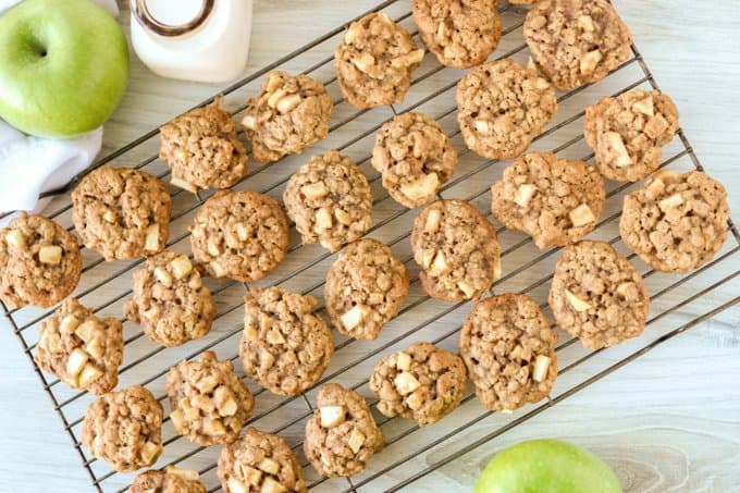 A rack full of cinnamon oatmeal cookies cooling.