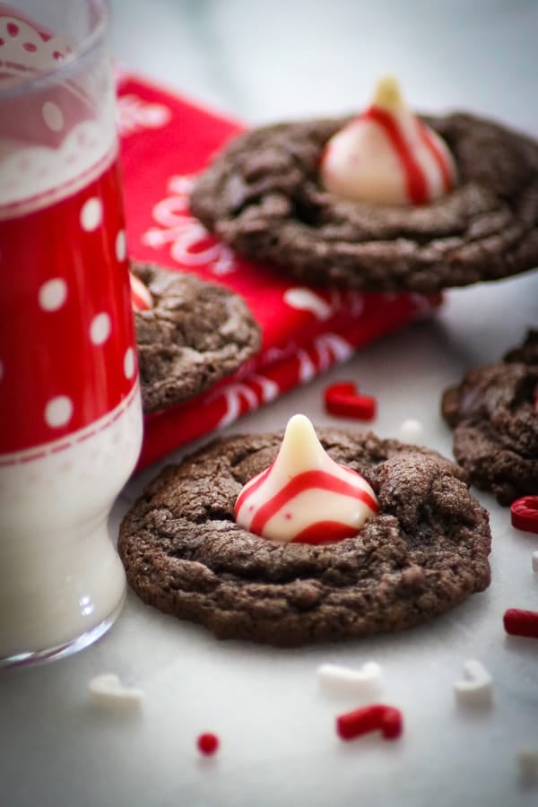 Double Chocolate Peppermint Kisses next to a glass of milk.