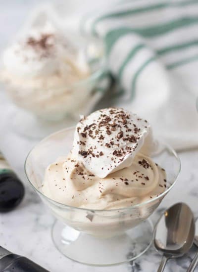 Whipped cream and chocolate shavings on a mousse made with Irish cream.