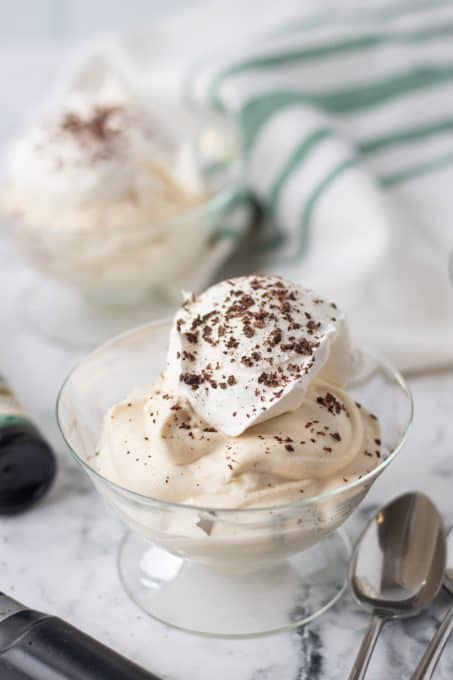 Whipped cream and chocolate shavings on a mousse made with Irish cream.