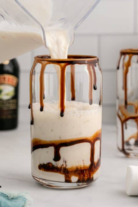 Pouring a mudslide into a glass.