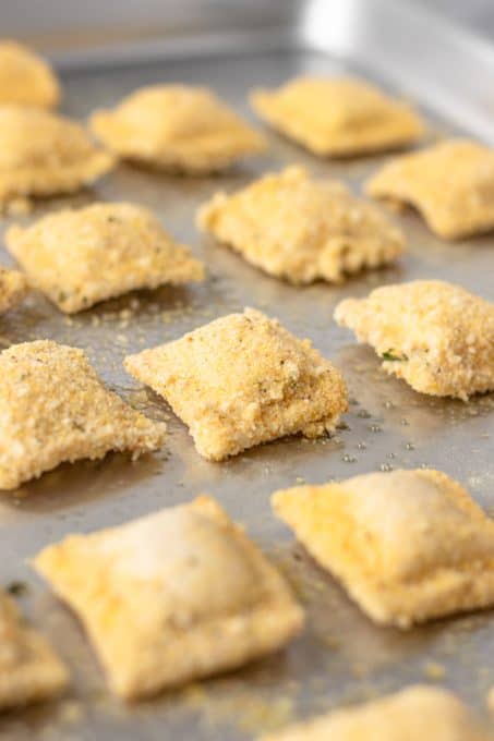Breaded ravioli ready for the oven.