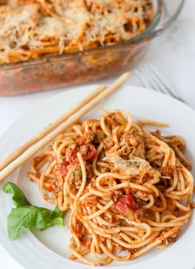 A plate of spaghetti with meat sauce baked in the oven.