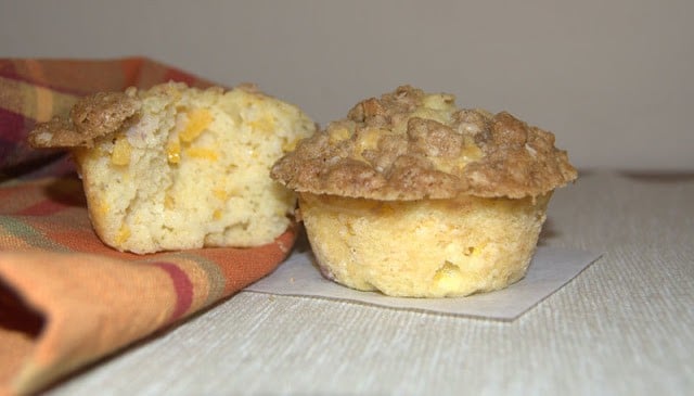 These Peach Streusel Muffins with fresh peaches and cinnamon streusel topping are a great addition to any summer breakfast, ladies brunch or bridal shower!