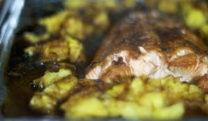 Salmon marinated in a brown sugar honey sauce and baked along side some fresh pineapple.