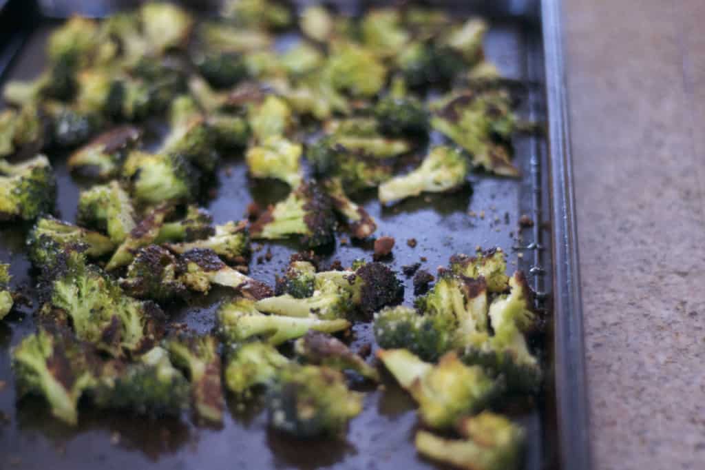 Broccoli tossed with olive oil, garlic powder and a touch of salt before being roasted in the oven to perfection~ from 365 Days of Baking & More.