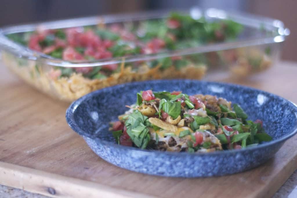 An easy weeknight dinner and a family favorite all in one dish - Taco Casserole!
