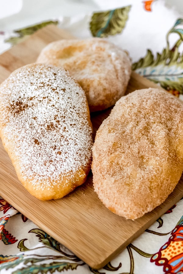 Three Doughboys aka Fried Dough, all coated in various sugar.