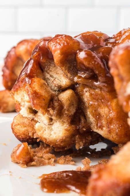 Pieces of bread dough with cinnamon sugar, brown sugar and butter.