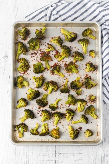 A sheet pan of roasted broccoli.