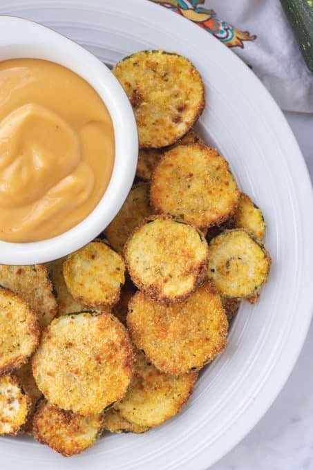 Cornmeal breaded zucchini cooked in the air fryer.