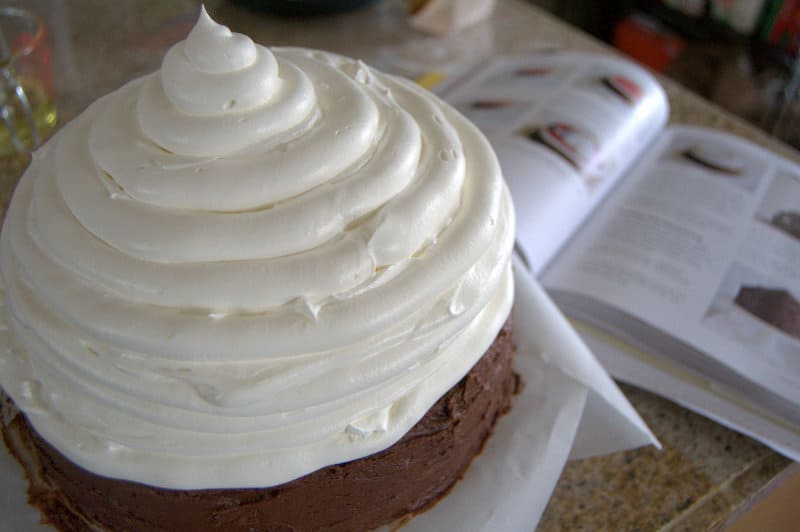 Neapolitan Hi-Hat Cake - a brownie, a strawberry cake, and Cool Whip. Delicious! From Surprise-Inside Cakes Cookbook