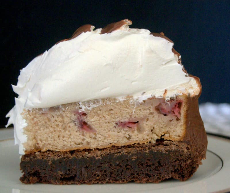 Neapolitan Hi-Hat Cake - a brownie, a strawberry cake, and Cool Whip. Delicious! From Surprise-Inside Cakes Cookbook