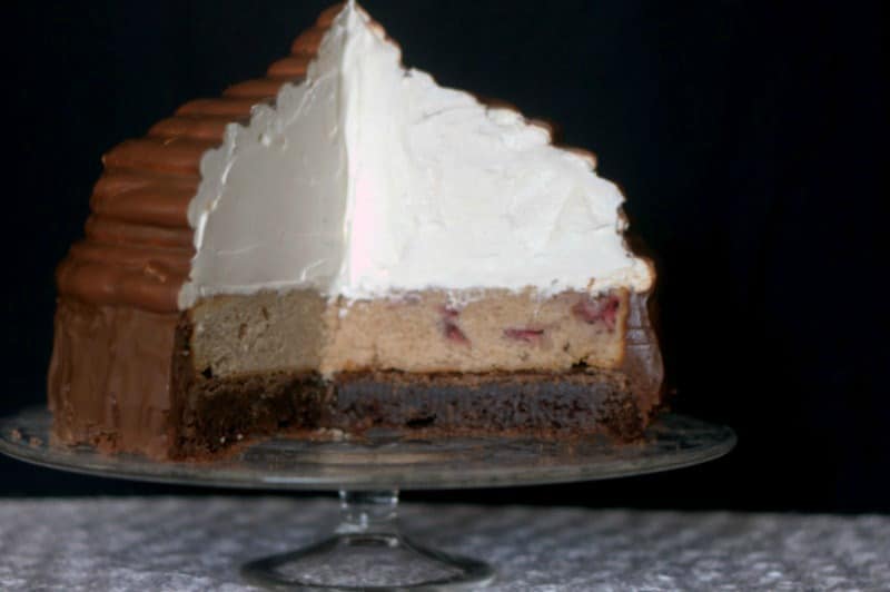 Neapolitan Hi-Hat Cake - a brownie, a strawberry cake, and Cool Whip. Delicious! From Surprise-Inside Cakes Cookbook