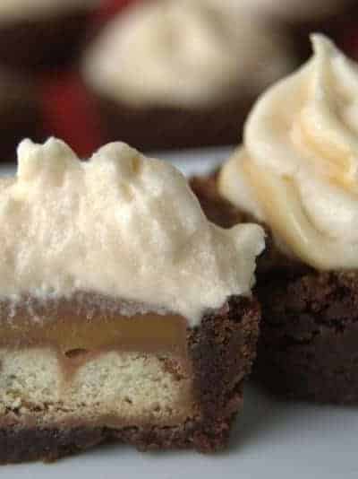 TWIX® Bites Brownies with Chocolate Caramel Buttercream Frosting - bite-sized brownies, each with a TWIX® Bite in the middle and covered with a Chocolate Caramel Buttercream Frosting.