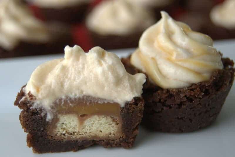 TWIX® Bites Brownies with Chocolate Caramel Buttercream Frosting - bite-sized brownies, each with a TWIX® Bite in the middle and covered with a Chocolate Caramel Buttercream Frosting. 