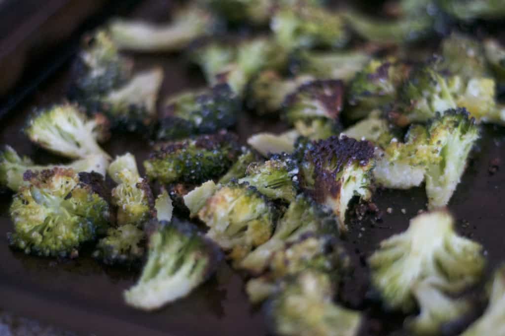 Roasted Parmesan Broccoli - broccoli florets tossed with garlic powder, olive oil and Parmesan cheese, roasted to give it an irresistable flavor!