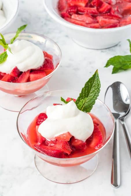 A bowl of strawberries that have been soaked in orange juice, sugar and Grand Marnier.