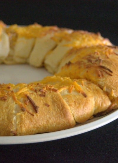 Barbecue chicken salad sprinkled with cheese, wrapped in crescent rolls for a fun dinner!