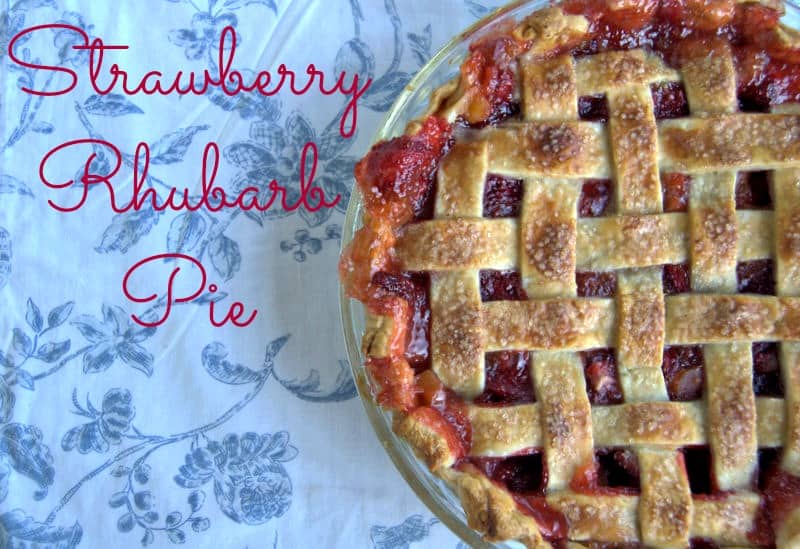 A lattice topped pie filled with a deliciously tart, yet sweet strawberry rhubarb filling accentuated with orange zest .