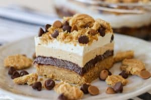 Layers of PB cookies, chocolate pudding, peanut butter cheesecake and Cool Whip.