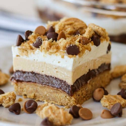 Layers of PB cookies, chocolate pudding, peanut butter cheesecake and Cool Whip.