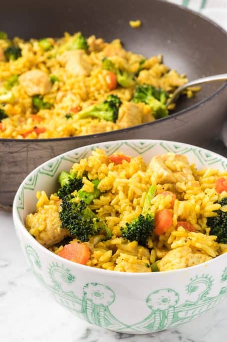 Broccoli, carrots, curried rice, and chicken.