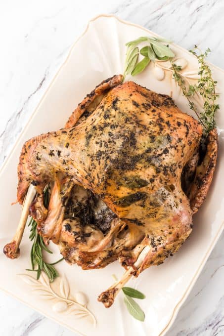 Sage, rosemary and thyme help make this Roasted Turkey extra delicious.