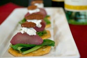 A great holiday appetizer - Merlot poached pears, arugula, and goat cheese. Flavor in every bite!